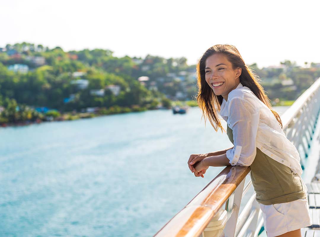 Woman overlooking Saint Lucia on cruise ship