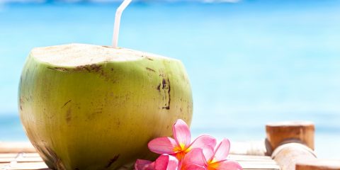 Coconut cocktail on beach