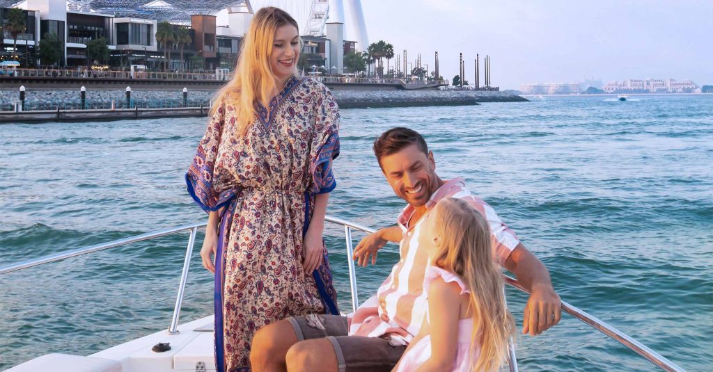 Family enjoying a yacht cruise in Dubai