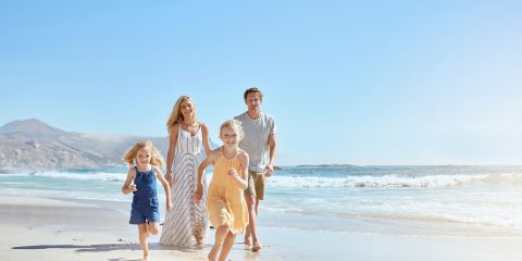 Family Walking on the Beach