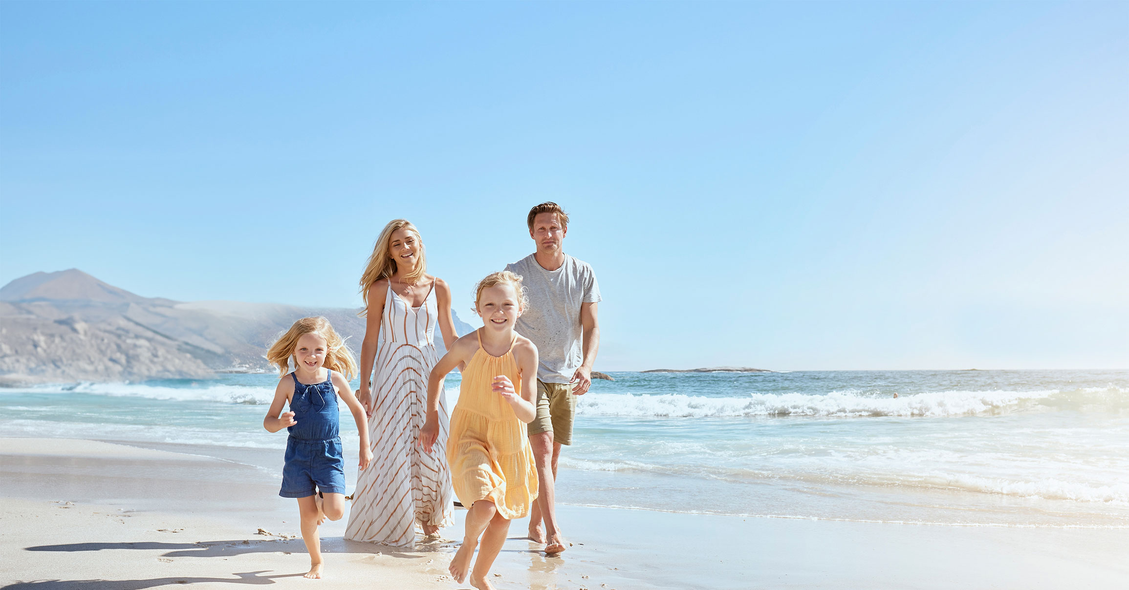 Family Walking on the Beach