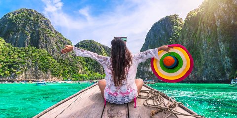 Girl on a longboat in Thailand
