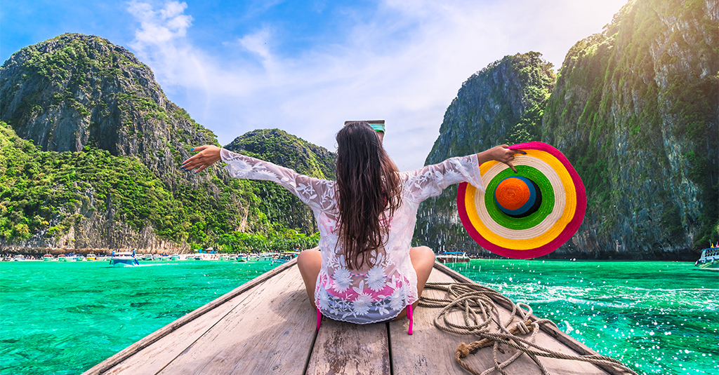 Girl on a longboat in Thailand