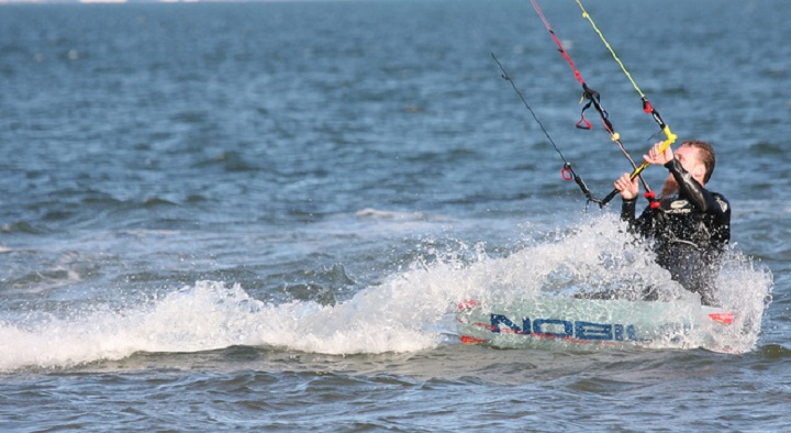 Man kitesurfing