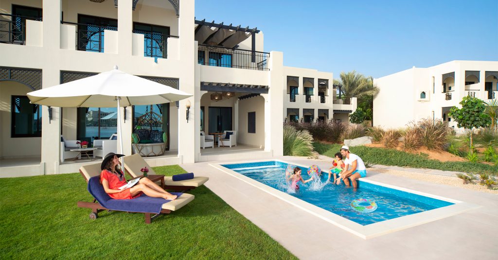 Family enjoying the pool at Hilton Ras Al Khaimah