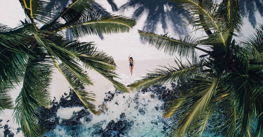 Woman relaxing on a beach in Mauritius