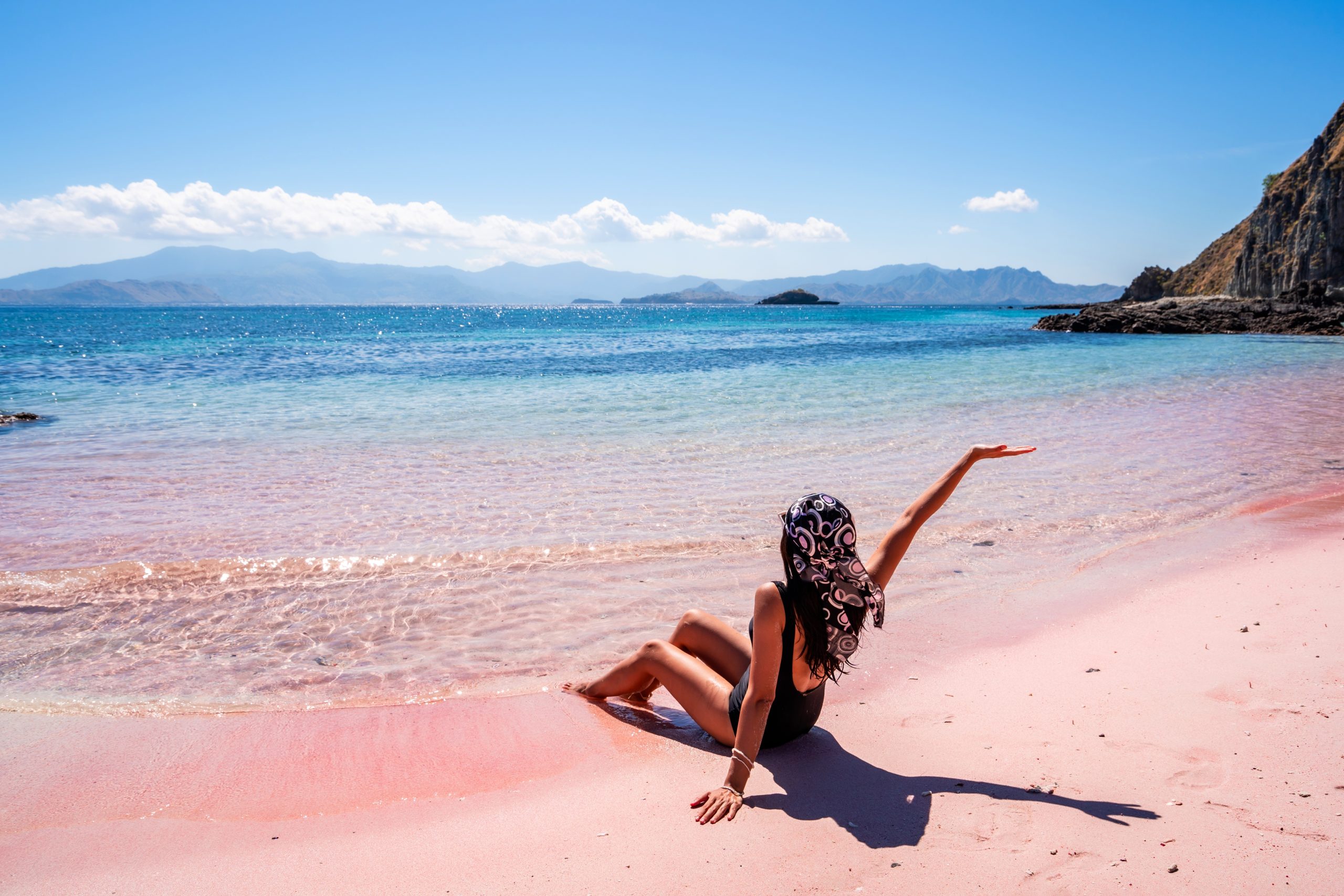 Woman in Pink beach Indonesia
