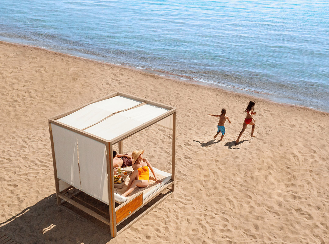 Family at beachfront at Ikos Dassia