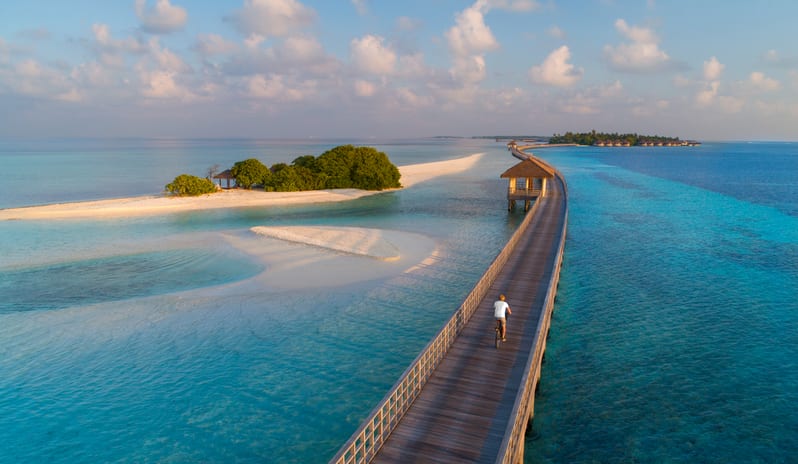 Cycling Along Bridge