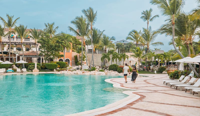 Sanctuary Cap Cana - Couple walking by pool
