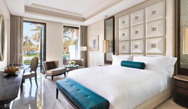 Al-Bustan-Palace-Ritz-Carlton-Deluxe-Lagoon-Access-King-Room-Bed