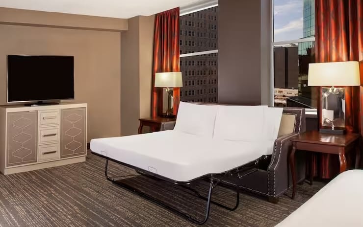 1 King Bed Deluxe Corner Room - Sofa Bed