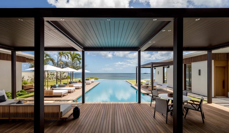 17_-beachfront-villa-pool-deck-and-beach-view-65552c69b3fd0