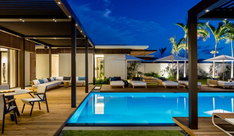 silversands-beachfront-villa-pool-deck-at-dusk-65552c6f7300c