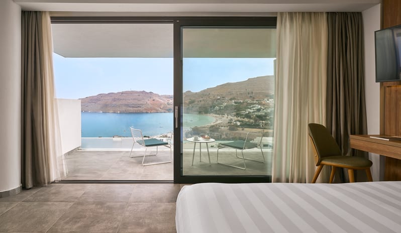 europe-holidays-greece-rhodes-lindos-grand-resort-spa-deluxe-junior-suite-eagles-eye-sea-view