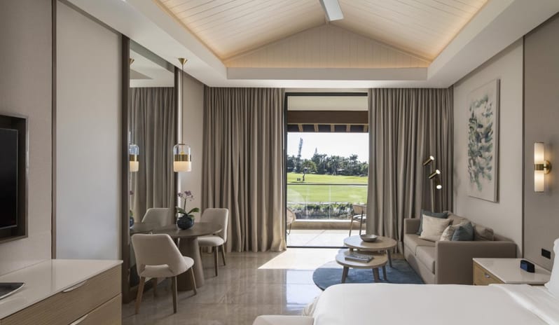 caribbean-holidays-dominican-republic-casa-de-campo-resort-villas-hotel-premier-junior-suite-patio-gardens- golf-course