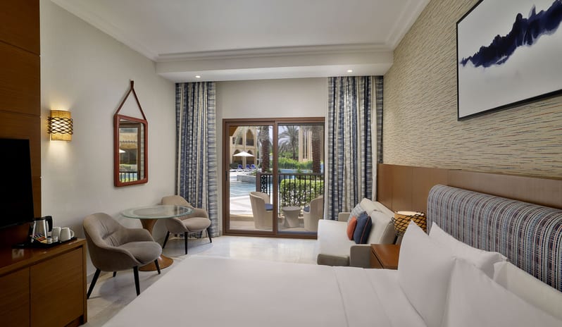 middle-east-holidays-ras-al-khaimah-doubletree-by-hilton-resort-spa-marjan-island-hotel-guest-room-with-pool-view