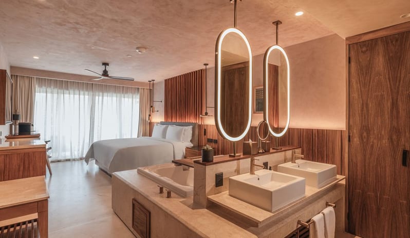 caribbean-holidays-cancun-riviera-maya-almare-a-luxury-collection-resort-isla-mujeres-deluxe-2- double-beds-partial-ocean-view