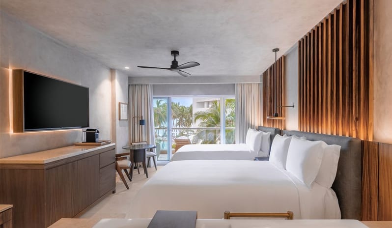 caribbean-holidays-cancun-riviera-maya-almare-a-luxury-collection-resort-isla-mujeres-deluxe-2- double-beds-partial-ocean-view