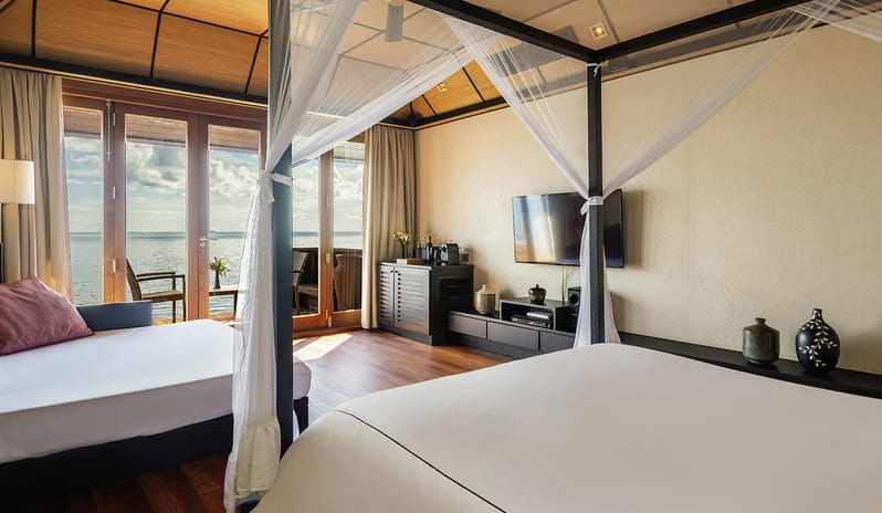 Lily Beach Resort & Spa - Rooms - Deluxe Water Villa bedroom