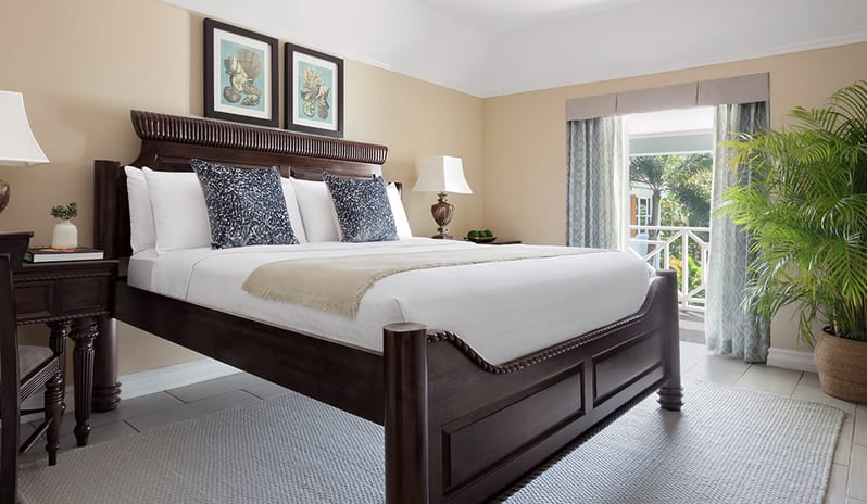 Bedroom at Sandals Ochi hotel in Jamaica by Kenwood Travel