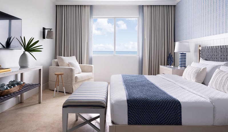 Bedroom at Sandals Royal Bahamian hotel in Caribbean by Kenwood Travel