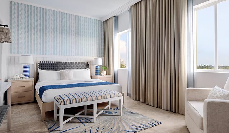 Bedroom at Sandals Royal Bahamian hotel in Caribbean by Kenwood Travel