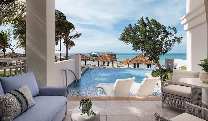 Pool with sea view  at Sandals Royal Bahamian hotel in Caribbean by Kenwood Travel