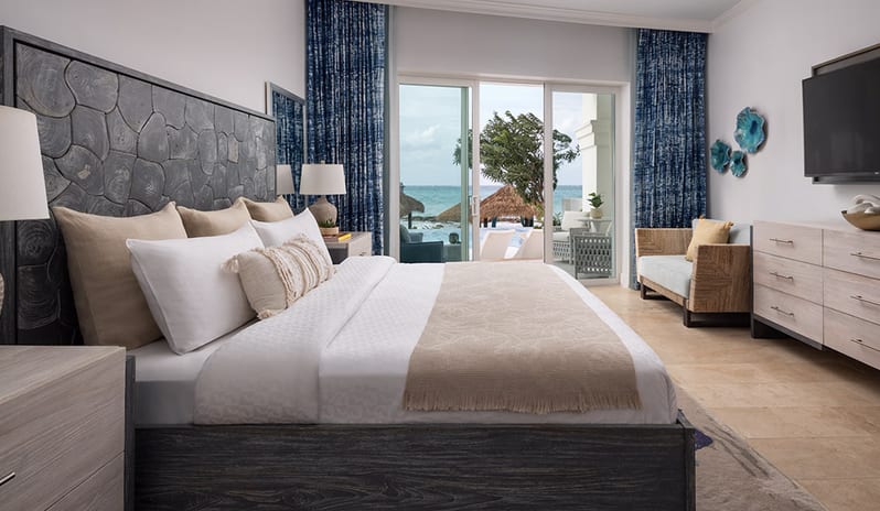 Bedroom at Sandals Royal Bahamian hotel in Caribbean by Kenwood Travel