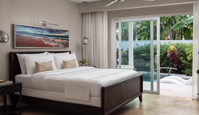 Bedroom at Sandals Royal Bahamian hotel in Caribbean by Kenwood Travel