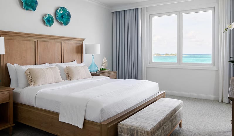 Bedroom at Sandals Royal Bahamian hotel in Caribbean by Kenwood Travel