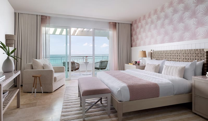 Bedroom at Sandals Royal Bahamian hotel in Caribbean by Kenwood Travel