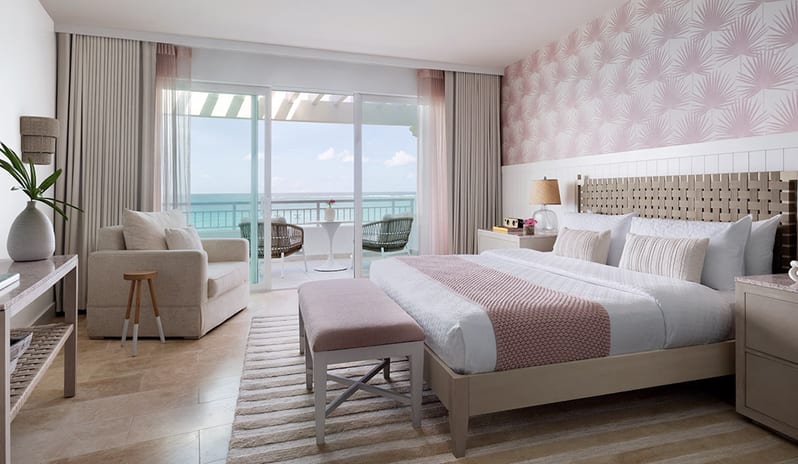 Bedroom at Sandals Royal Bahamian hotel in Caribbean by Kenwood Travel