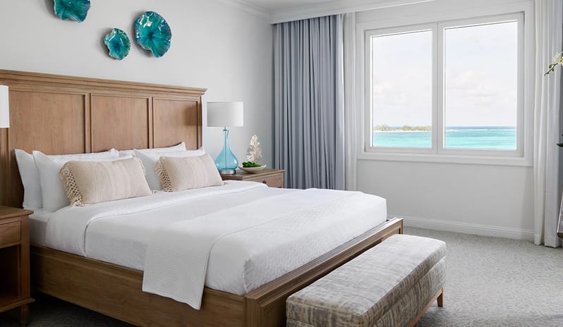 Bedroom at Sandals Royal Bahamian hotel in Caribbean by Kenwood Travel