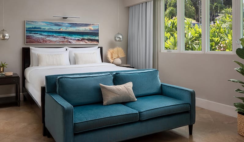 Bedroom at Sandals Royal Bahamian hotel in Caribbean by Kenwood Travel