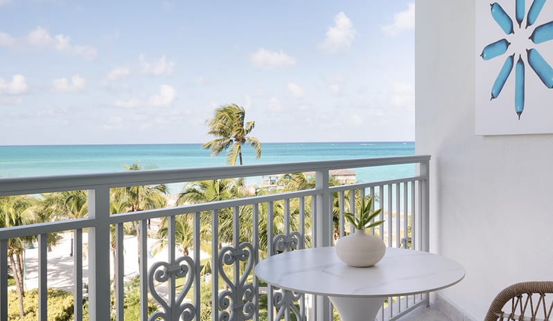 Balcony at Sandals Royal Bahamian hotel in Caribbean by Kenwood Travel