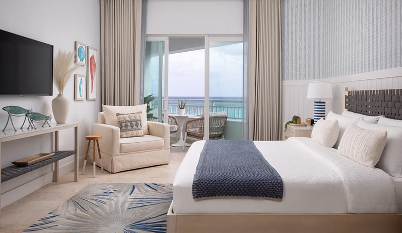 Bedroom at Sandals Royal Bahamian hotel in Caribbean by Kenwood Travel