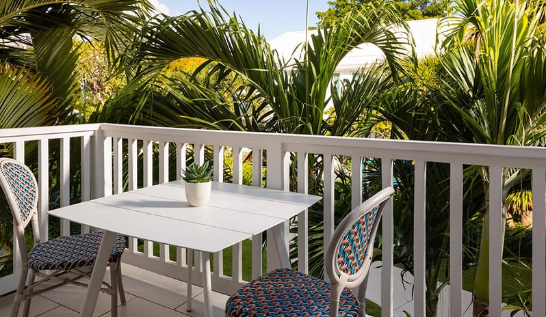 Balcony at Sandals Royal Bahamian hotel in Caribbean by Kenwood Travel
