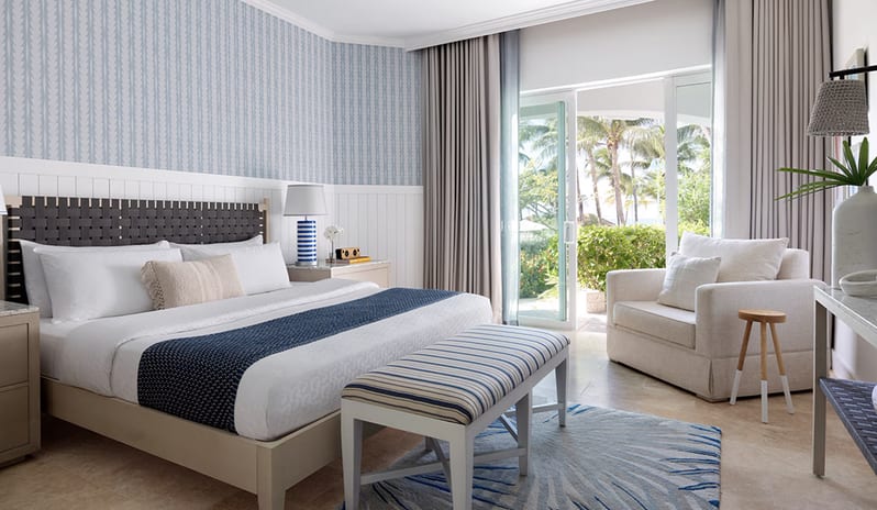 Bedroom at Sandals Royal Bahamian hotel in Caribbean by Kenwood Travel