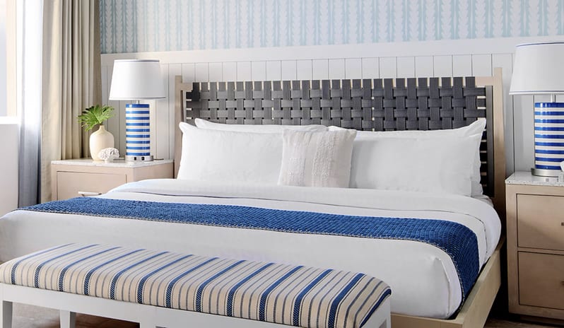 Bedroom at Sandals Royal Bahamian hotel in Caribbean by Kenwood Travel