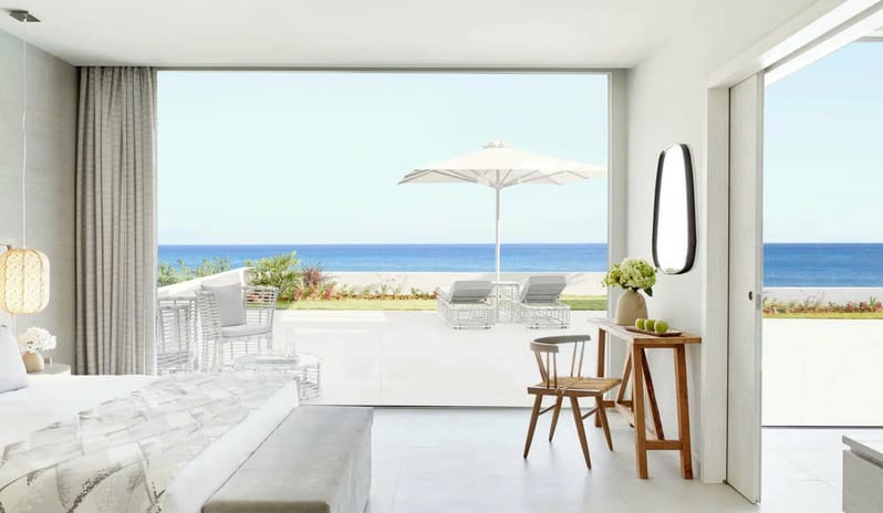 bedroom at Ikos Aria hotel in Europe by Kenwood Travel