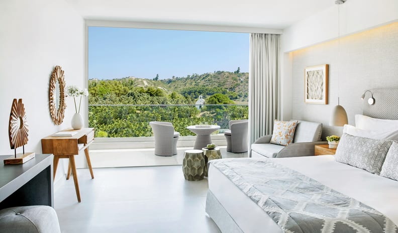 bedroom at Ikos Aria hotel in Europe by Kenwood Travel