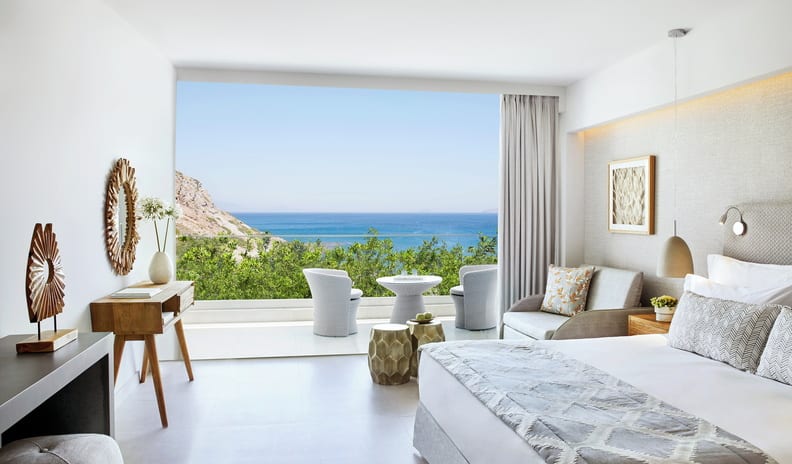 bedroom at Ikos Aria hotel in Europe by Kenwood Travel