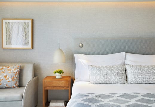 bedroom at Ikos Aria hotel in Europe by Kenwood Travel