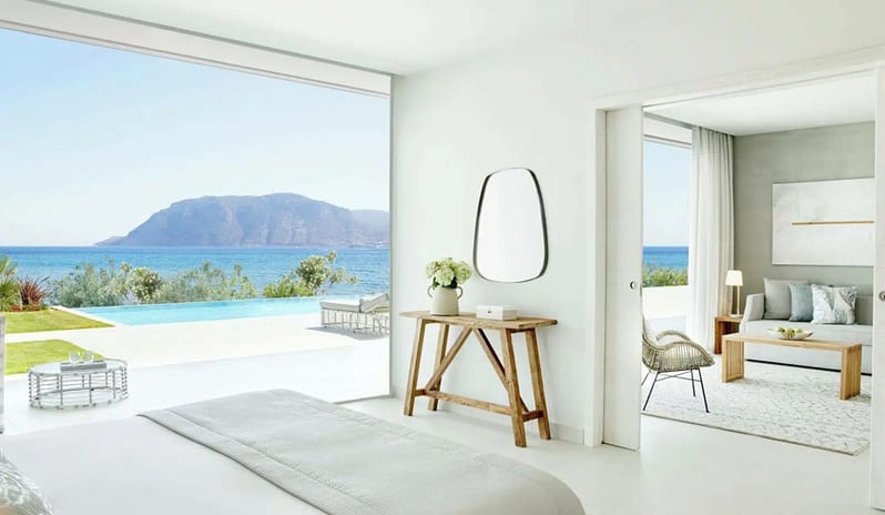 bedroom at Ikos Aria hotel in Europe by Kenwood Travel