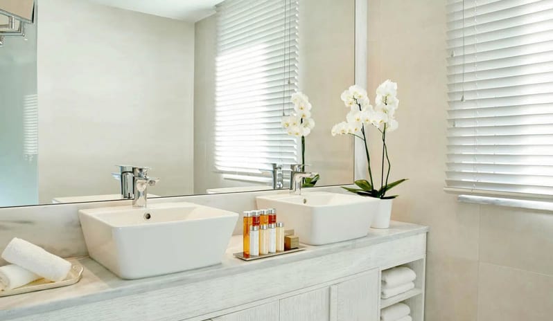 bathroom at Ikos Aria hotel in Europe by Kenwood Travel