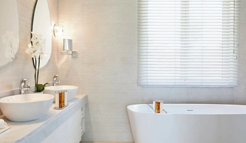 Bathroom at Ikos Aria hotel in Europe by Kenwood Travel