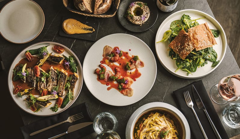 Jerár Restaurant Top View of Gourmet Fine Dining Dishes with Elegant Plating at Domes Miramare by Kenwood Travel