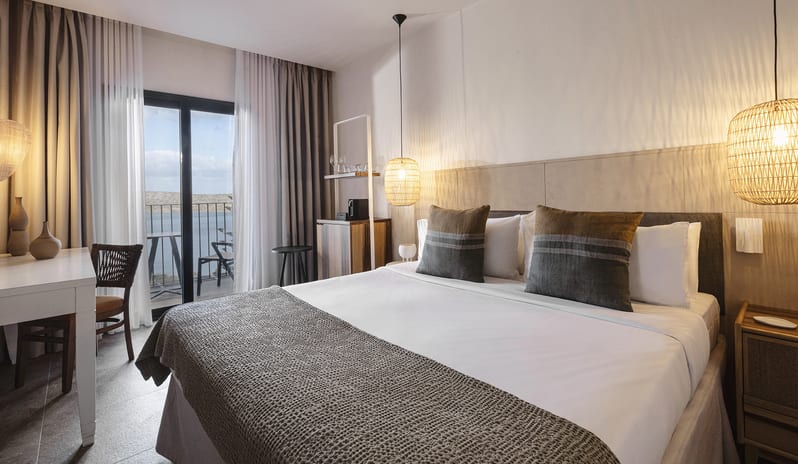 Sapphire Cozy Nest Elegant Bedroom with Balcony and Scenic View at Domes Aulūs Elounda by Kenwood Travel