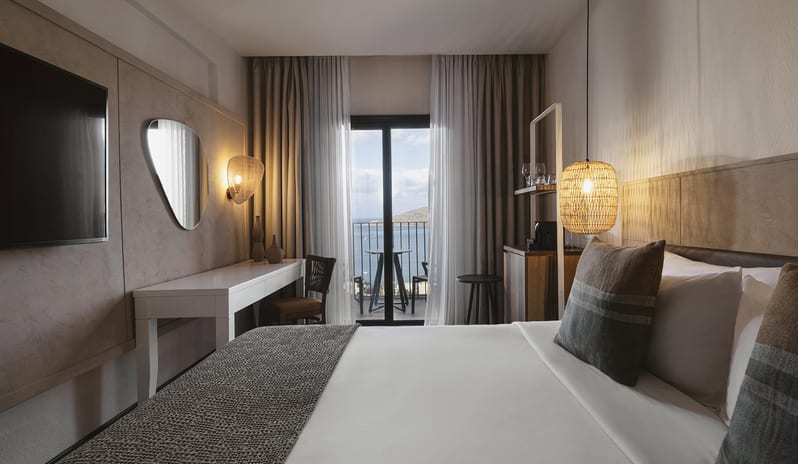 Sapphire Cozy Nest Elegant Bedroom with Balcony and Scenic View at Domes Aulūs Elounda by Kenwood Travel